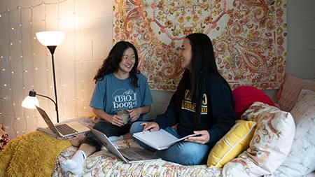 Students talking in dorm room